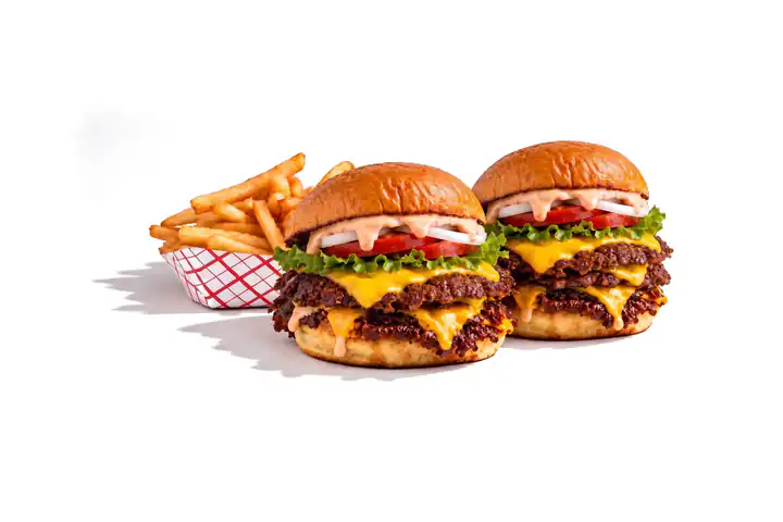 2 Triples and Fries — Two triples (three patties, three slices of cheese each) and a side of fries.