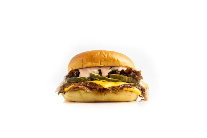 Chris N Eddy's Slider — Two smashed patties, two slices of cheese, buttered and toasted Martin’s potato roll.